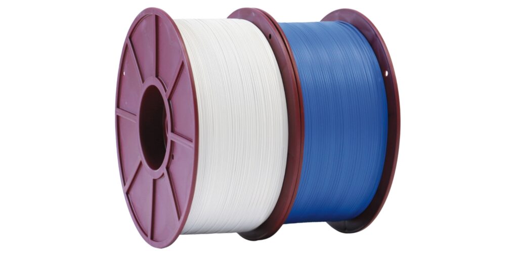 White and blue plastic twistband on a reel